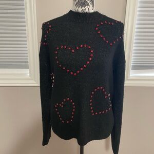 Ricki’s BNWT Black Sweater with Red Heart Accents